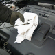 Photo of Mechanic Checking Motor Oil Dipstick