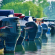 photo of small boats in marina showing just the motors